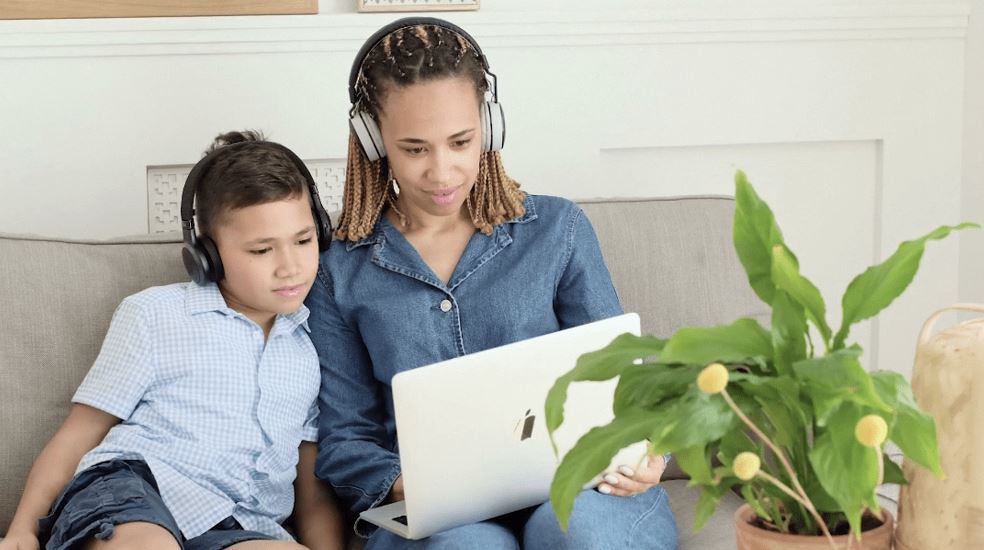 enjoying music in bluetooth headphones